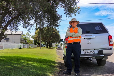 Council's Principal Ranger Jason Mullee pictured standing on a street with a large nature strip and car park legally.