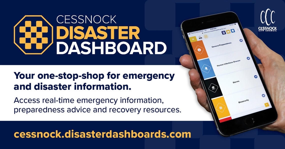 Photo of hand holding a phone with the Cessnock Disaster Dashboard open in a web browser
