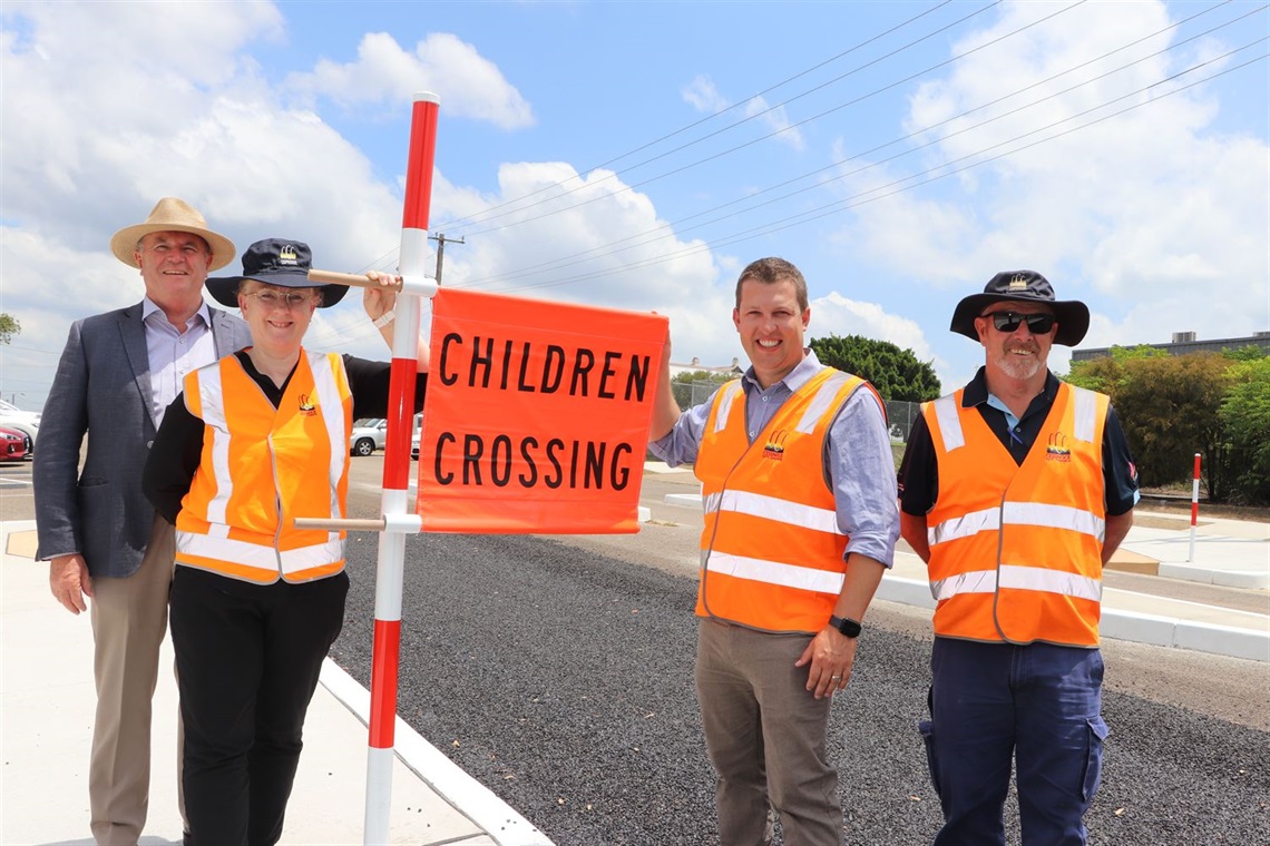 Council staff with school zone infrastructure