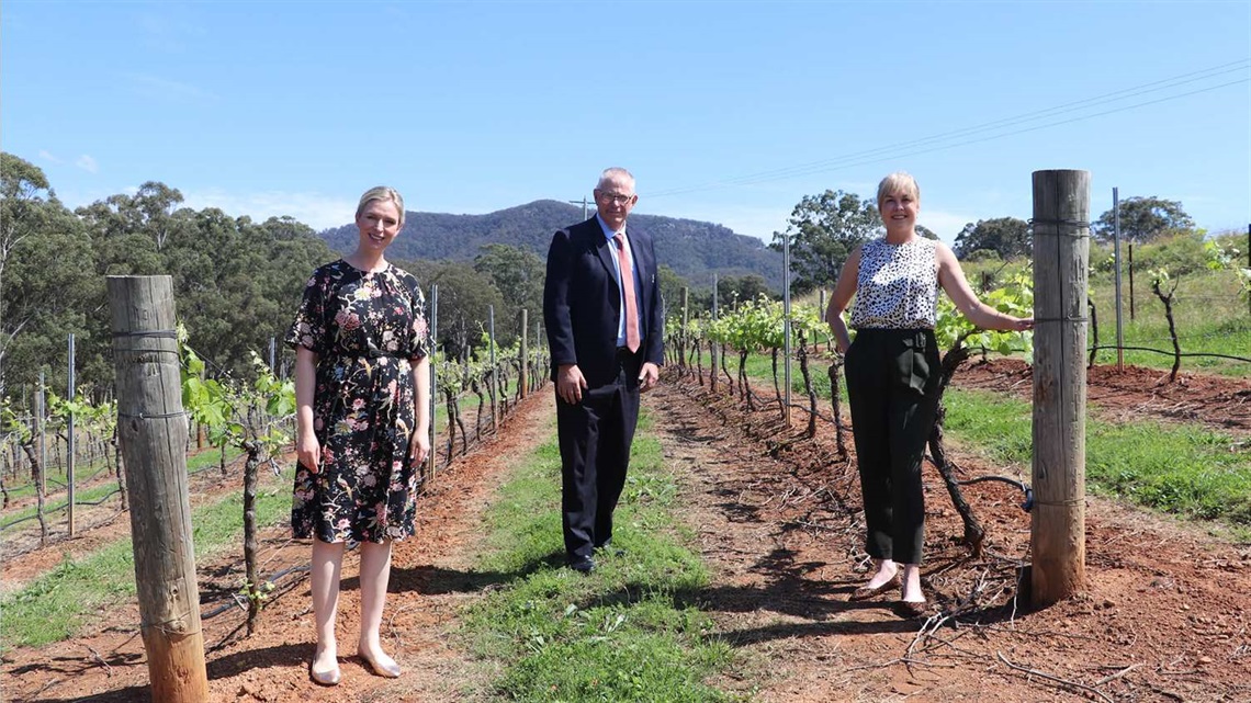 Photo of Amy Cooper, CEO, HVWTA, Cessnock City Mayor, Councillor Bob Pynsent and Christina Tulloch, President of the HVWTA in vineyard