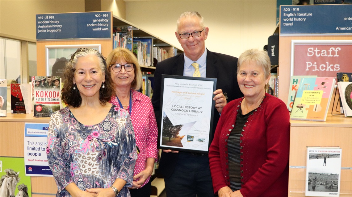Photo of Cessnock Library local studies librarian Kimberly O'Sullivan, Library Services Coordinator Rose-marie Walters, Cessnock Mayor Bob Pynsent (holding the Tidy Towns award) and Deborah Barry from Cessnock Tidy Towns