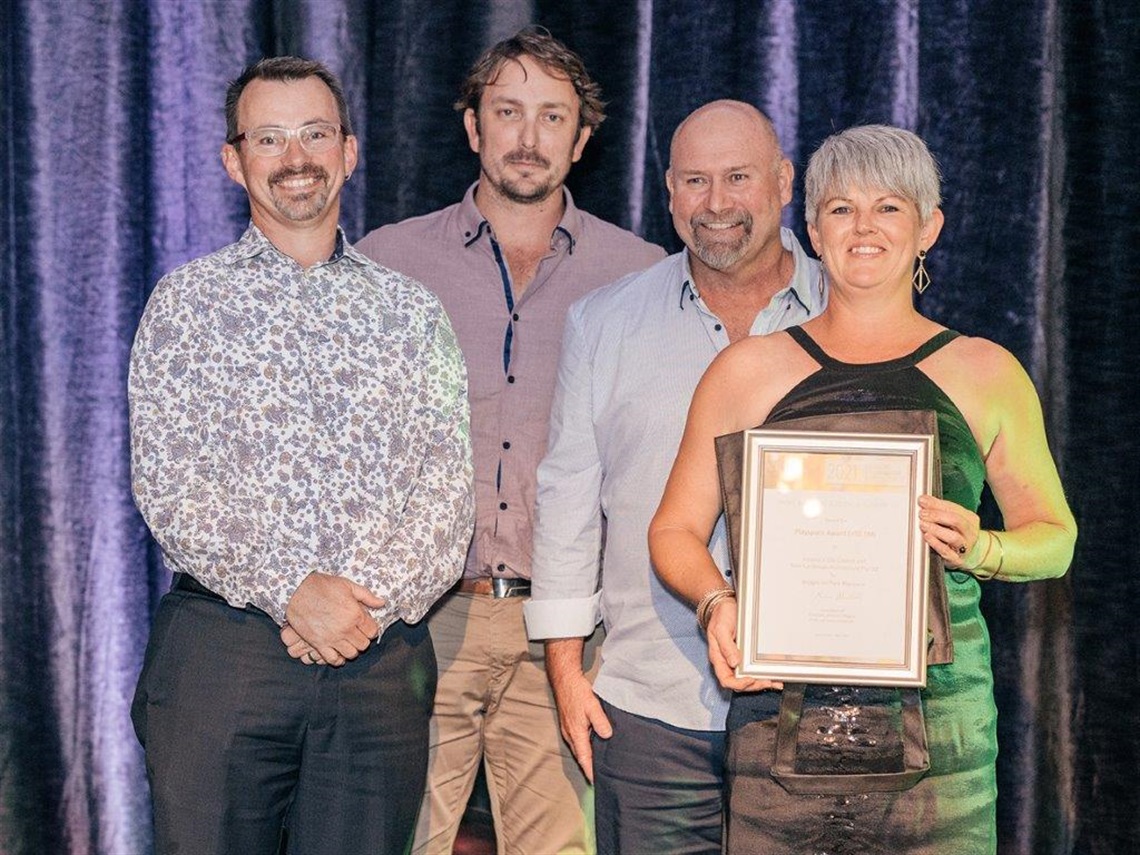 Image of Moir Landscape Architecture's Tim Buyk alongside Council staff who worked on the project Matt Gordon, Lyall Green and Nicole Benson accepting the award.