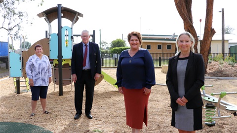 Community members, Council staff, Member for Paterson Meryl Swanson MP, Cessnock City Mayor Councillor Bob Pynsent and Cessnock City Council General Manager Lotta Jackson standing in the Bluey Frame Park playground area