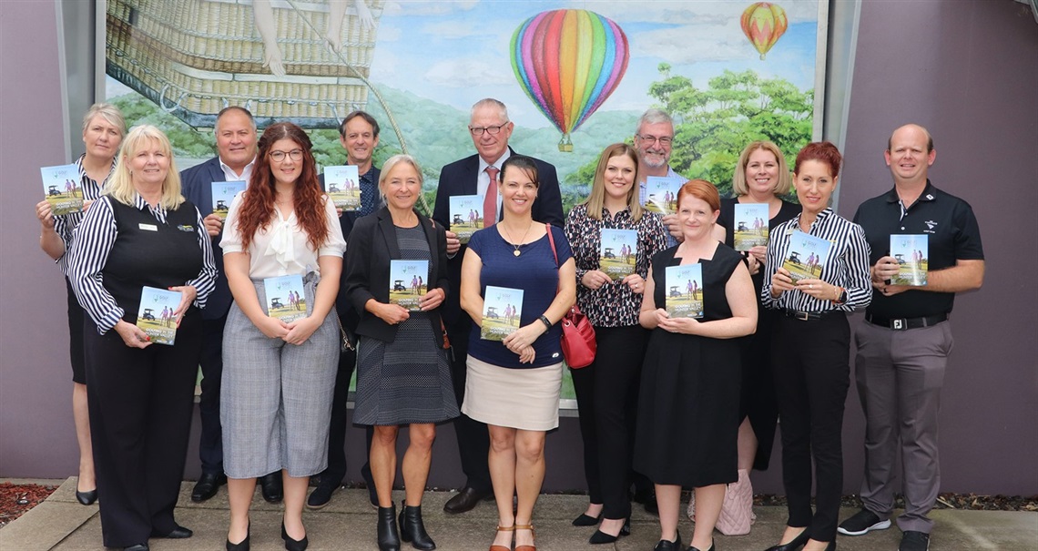 Image of Council staff a the Hunter Valley Visitor Information Centre at the launch of the local golfing brochure