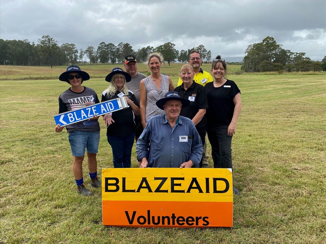 Cessnock City Council's Community Recovery Officer Melissa Boucher, Camp coordinator Judy Robbins, Singleton Council's Emergency Management and Engagement Officer Kylie Wallace with BlazeAid volunteers Susie, Dot, John, Dave and Jeff